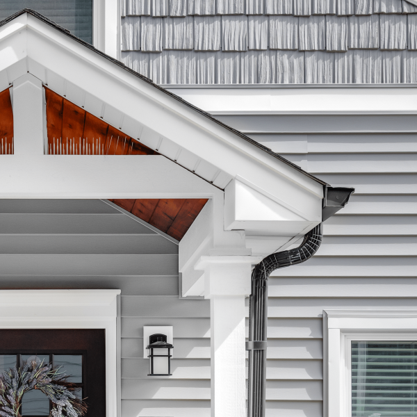 Zoomed photo of Midwest home showing siding, soffit, and fascia